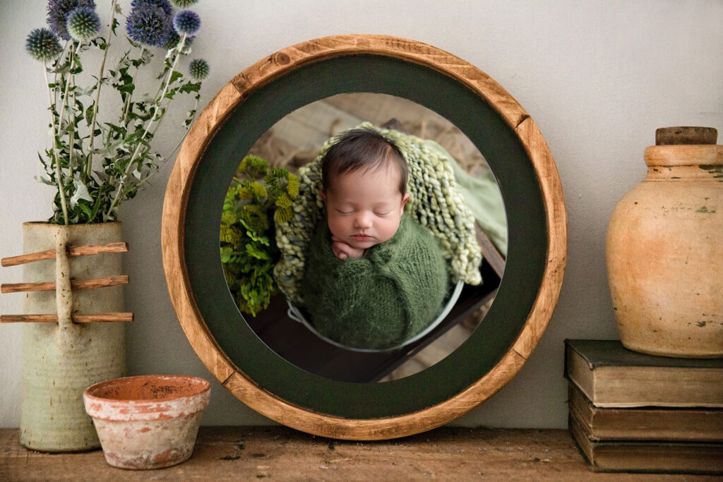 Unique round frame with photo of newborn boy